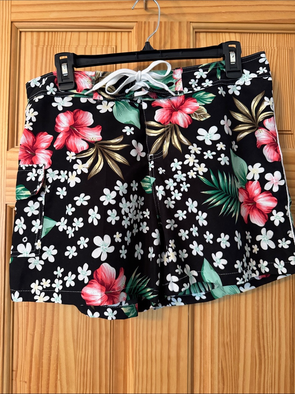 raya sun Black Floral Swim Shorts with Pink Hibiscus and Green Leaves